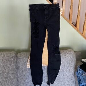 American Eagle Stretch Black Wash Denim Distressed Skinny Jeans. Unfinished hems